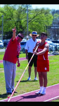 Steven Moreno is getting coached by Coach Jones Jones while Clyde Jones looks on. (Courtesy photo)