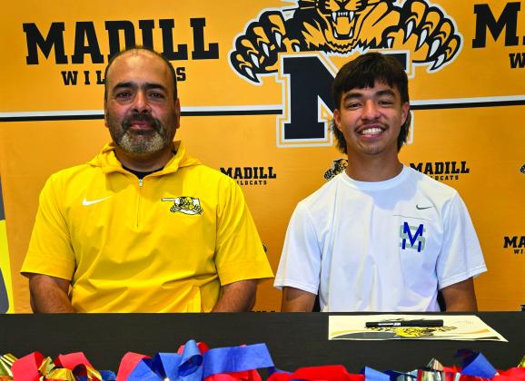 Miguel Fajardo, right, signed his college intent letter to play soccer at Murray State College. He is seated with Madill soccer head coach Jose Cortes, left. (Courtesy photo)