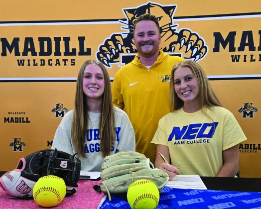 Ireland Groeber and Dahlia Marris both signed their college letters of intent. They are pictured with Madill softball head coach  Jared Hayes. (Courtesy photo)