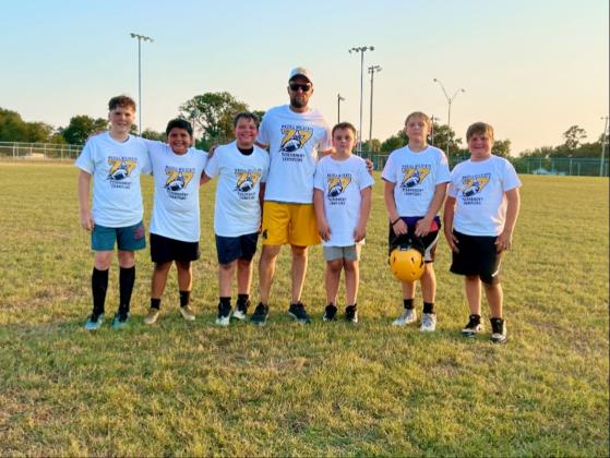 Bodey, TJ, Case, Cannon, Julien, Beau and Coach John won the championship. (Courtesy photo)