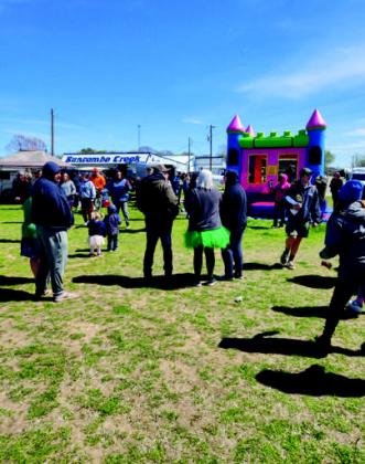 The event had food and entertainment like a bouncy house.