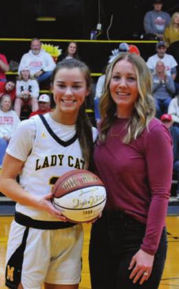 Jayden Weiberg, with Meagan Carter Rose, was honored for achieving 1,000 career points. She also surpassed Rose’s 2007 three-point record. Summer Bryant • The Madill Record