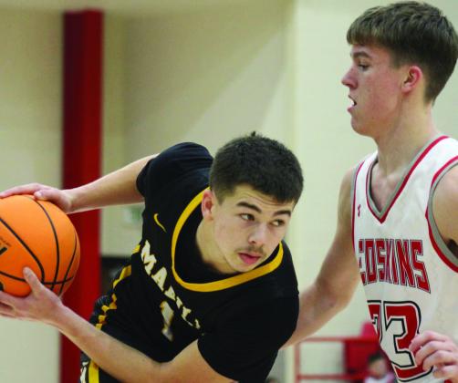 Brylan James, Madill, and Hudson Everhart, Kingston go head-to-head. Photo by Summer Bryant