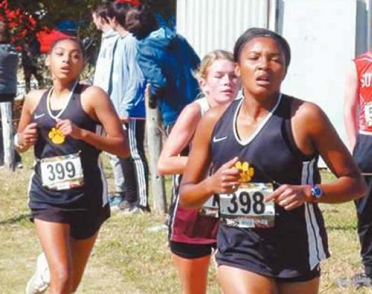 Joslyn Stumblingbear (Madill in front), Mercedes Stumblingbear (Madill in back, left) Brandon Jacks