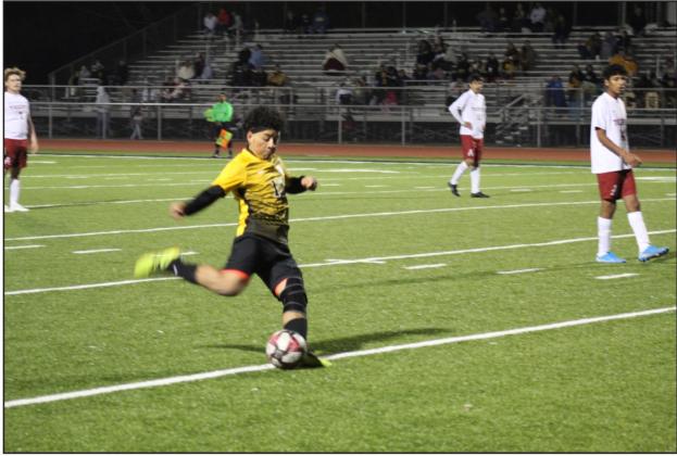 Francisco Perez (13) shows his goal scoring form on a free kick against Ardmore. He scored two goals in the game. Glenn Price • The Madill Record