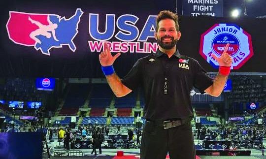 Coach Peter Hammer officiating the USMC Junior Nationals in Fargo, ND. Courtesy photo