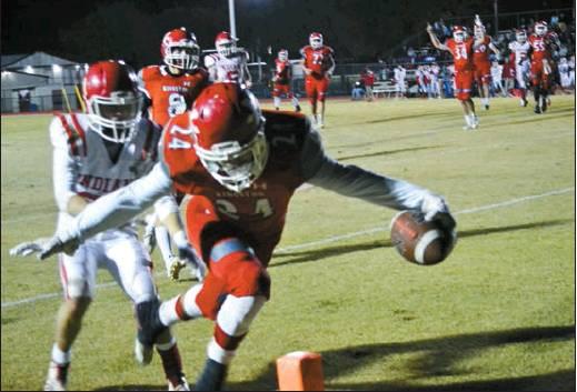 Lori Robinson • The Madill Record Kingston junior running back AJ McKinney stretches his arms into the endzone for a touchdown in the Redskins 44-0 win over Comanche on Nov. 1.