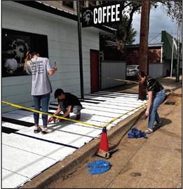 KHS Art students paint a piano for coffee lovers