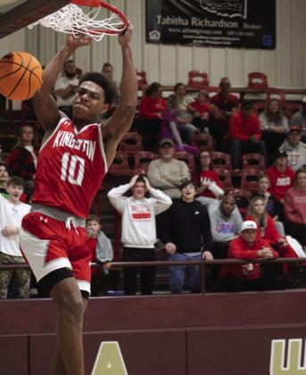 Sam Walker dunks the ball. Kevin Farr