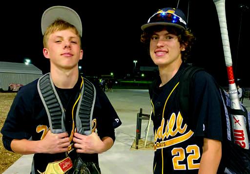 Caden McHatton and John Woody smile before a game. Brenda McHatton