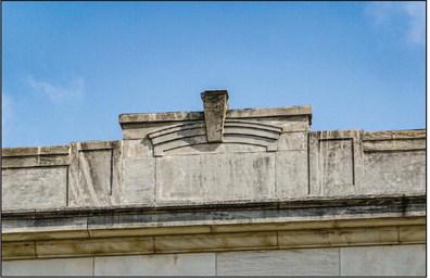 The top center cornice of the courthouse today. Photo courtesy of Gary Henry