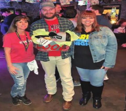 Edna’s in Oklahoma City is the 50th establishment to become smoke free. From left to right is Tammy Lucas, owner of Edna’s, Mason Ward, patron and raffle winner, and Maria Grundy, Campaign Manger for Free the Night. Courtesy Photo