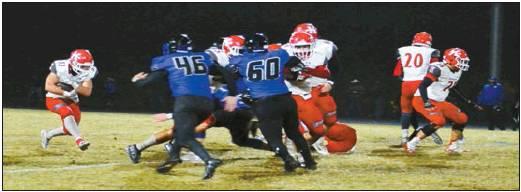 Lori Robinson • The Madill Record Kingston sophomore running back Brandon Watson (33) carries the ball in a game Oct. 25 against Dickson.