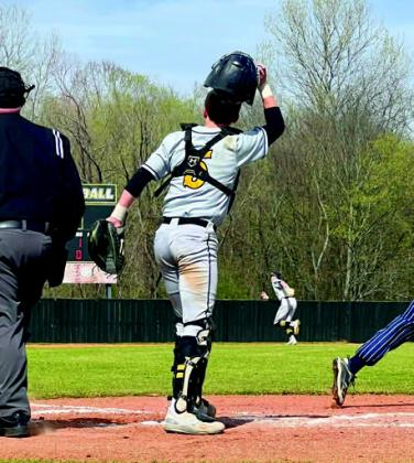 Brenda McHatton Madill fell to Broken Bow 10 to 4 during the Broken Bow tournament March 13. They suffered a loss to Hartshorne on March 14. They beat Rock Creek 11 to 2 on March 15, but lost to Thackerville 14 to 5 and to Marlow 9 to 0 on March 20. Pictured: Caden McHatton plays catcher at the Marlow game.