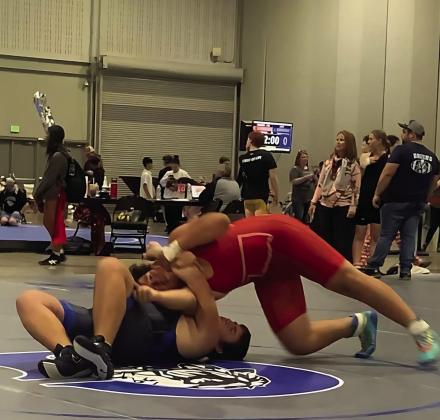 Lucas Franklin executing a gator roll on his Greco opponent. Courtesy photo