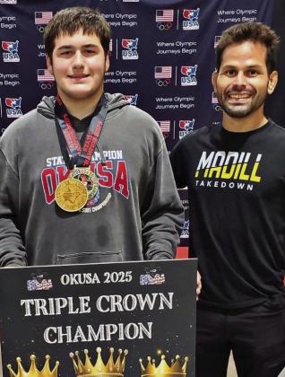 Lucas Franklin displaying his Freestyle and Greco gold medals with his Triple Crown Champion win alongside Coach Peter Hammer. Courtesy photo