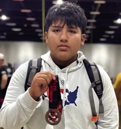Alex Sarabia with his bronze medal at the USAOKW State Freestyle / Greco Championships in Tulsa, Okla. Courtesy photo