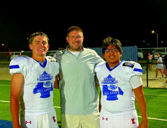 Reid Patterson, left, and Jaime Lewis, right, both were part of the Native American All-State. They are pictured with Coach Brad Hill.