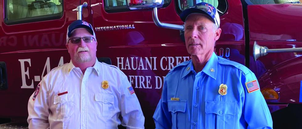 The month of August marks 25 years of service for Chief Saxon and Assistant Chief Combs of the Hauani Creek Fire Department. Courtesy photo