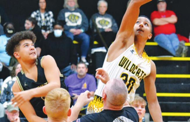 Mason Coles fi ghts off the opponent during the Madill v Marietta game. Madill won the game 66 to 27. Summer Bryant • The Madill Record