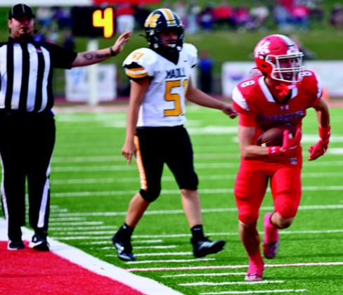 Hudson Everhart runs the ball down the field. KHS Yearbook