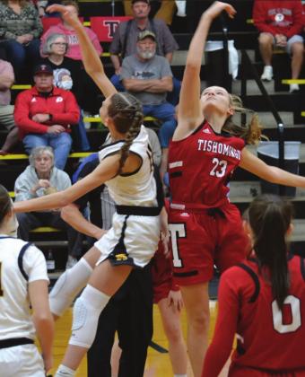 Summer Bryant • The Madill Record Abbie Lambertsen goes up for a jump ball tipoff during the Madill v. Tishomingo game on December 3, 2021. They won 43-13.