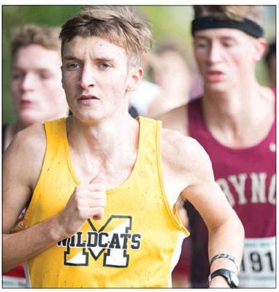 Top left: Madill senior Chris Bennett (2067) (2066) runs in the 2019 4A OSSAA State Championship Cross Country Meet on Oct. 26.