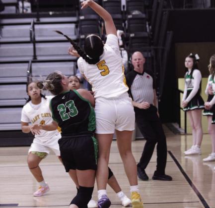 Arlette Andrade goes for a jump shot. Summer Bryant