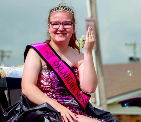 Maycee Webb, Oklahoma Miss Amazing Junior Teen Queen 2025, waves during the Kingston July 4th Parade. Matt Swearengin
