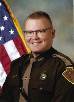 Courtesy photo OHPTrroper Garrett Schulze is heading back to Marshall County to patrol the same highway as his late father.