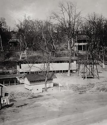 The front left is the service station, front center is the confectionery, center left is the pool, center back is the dance pavilion, in the background from left, cabin, main cottage and secondary cottage. The Main Cottage is still standing to this day.. Courtesy photo