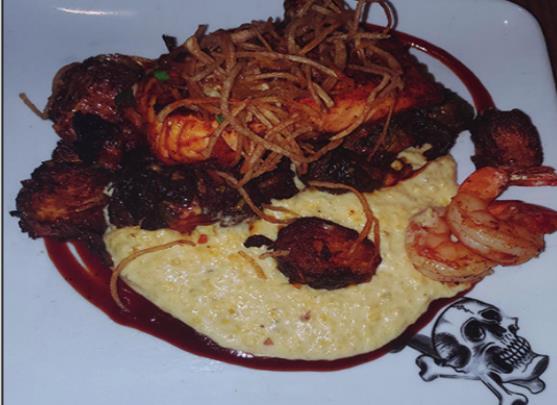 BBQ-seared salmon with cheesy shrimp and grits and charred brussels sprouts. Jedi Chef Stryker