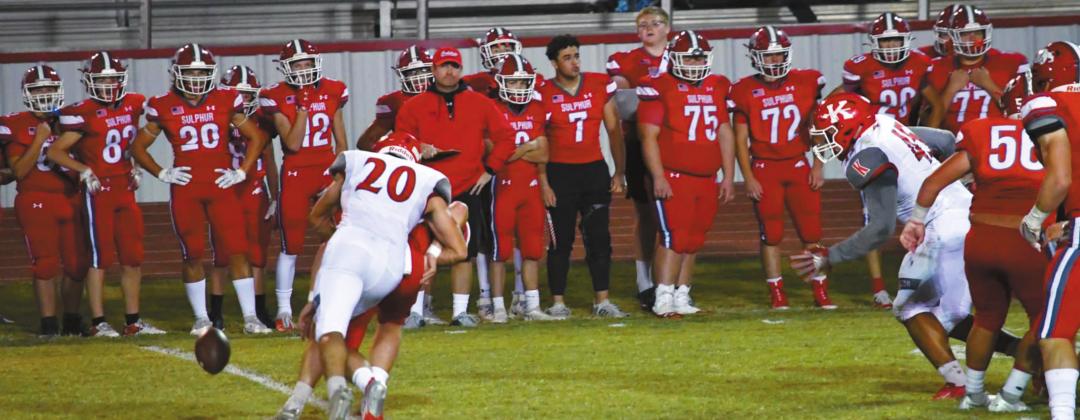 Kingston senior Matthew Hawkins sacks Sulphur quarterback Reese Ratchford in the second quarter, forcing a fumble that would lead to the Redskins’ second touchdown of the night. Linda Holmes