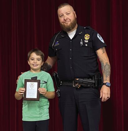 Gavin, a 10-year-old boy from Kingston was awarded the Life Saving Award for rushing to his mother's side after she had a medical episode. Summer Bryant • The Madill Record
