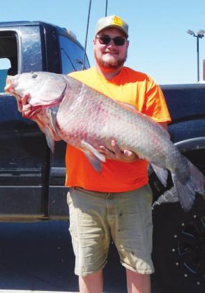 Oklahoma has a new state record fish. The new record bigmouth buffalo was caught by Boe Meehan and weighed-in at 66 pounds and 4 ounces. Boe caught the behemoth while fishing Greenleaf lake in eastern Oklahoma. Photo Courtesy of Oklahoma Department of Wildlife Conservation