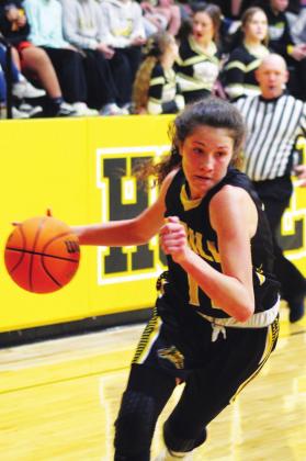 Madill senior Kristen Chapa drives toward the basket in a Feb. 21 game at Tecumseh. Glenn Price • The Madill Record