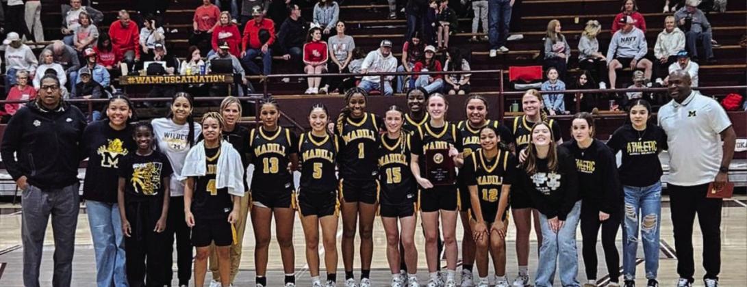 Courtesy photos The Madill Lady Cats won the Wampus Cat Classic Tournament. Elexis Holmes was named tournament MVP and E’Niyah Holmes (both pictured right) was named All-Tournament.