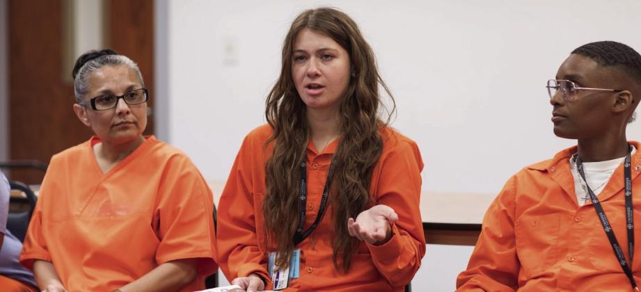 (L to R): Rachel River, Lindsey Smith, and Erica Bonner discuss their work on the Mabel Basset Balance. Prisoners at Mabel Bassett Correctional Center in McLoud participate in an award-nominated prison journalism program. Brent Fuchs • Oklahoma Watch