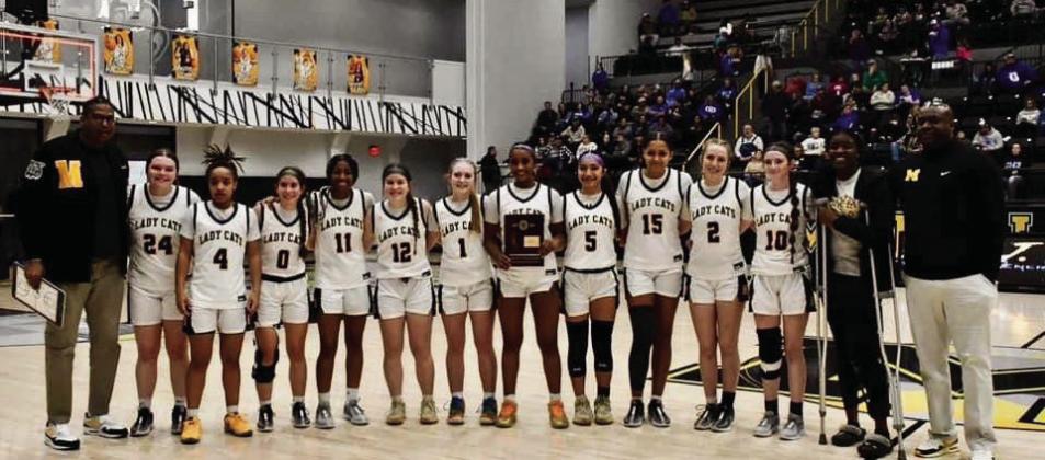 Lady Wildcats advance to regionals after win