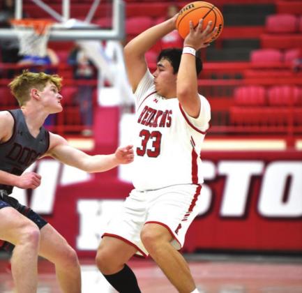Dakota Wiebner shoots a basket during the Redskins v Sulphur game on February 12, 2022. Crockett Uber