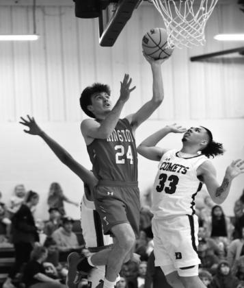 Braden Matchen goes for a layup during the Kingston v Dickson game on February 11, 2022. Crocket Uber