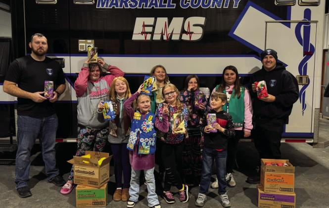 Marshall County Girl Scout Troop 3439 visited Marshall County EMS for a tour and donated 50 boxes of cookies to the first responders. Courtesy photo