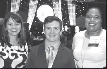 Courtesy photo Bonham Honored Kelly Goff  (left), a biology and environmental science teacher from Madill High School (left), and Alexis Carter-Black (right), development director for the Samuel Roberts Noble Foundation,  congratulate Madill Academic All-Stater Rio Bonham during the Oklahoma Foundation for Excellence Academic Awards Banquet, held recently in Tulsa. Bonham selected Goff as his honored teacher guest at the banquet.