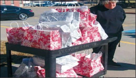 Courtesy photo Kim Gentry and Phyllis Cox, along with the assistance from Tammy Smith and Sherrie Orr, made and distributed quilts to the Ardmore Vets on December 10. Barbara Reboldt donated the materials.