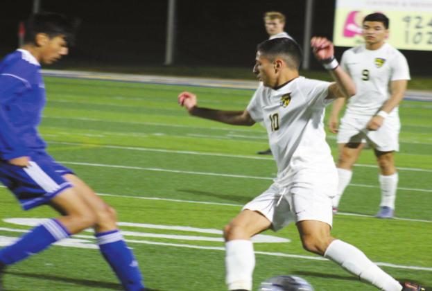 Diego Ibarra (10) works to control the ball during the Madill game against Durant. The Wildcats defended the Lions 4 to 2 in an extremely physical rival game. Glenn Price • The Madill Record