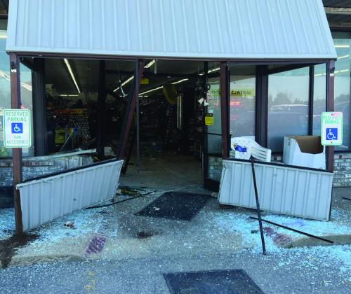 Damage to Dollar General after car drives through