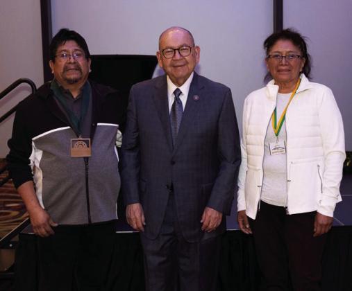 Chickasaw Nation Governor Bill Anoatubby, center, congratulates Raylan Edaakie, left, and Patty Edaakie, right, for winning “Best of Show” at the recent Hushtola’ Art Market. Mr. and Mrs. Edaakie are New Mexico Pueblo Zuni tribal members. Courtesy photo