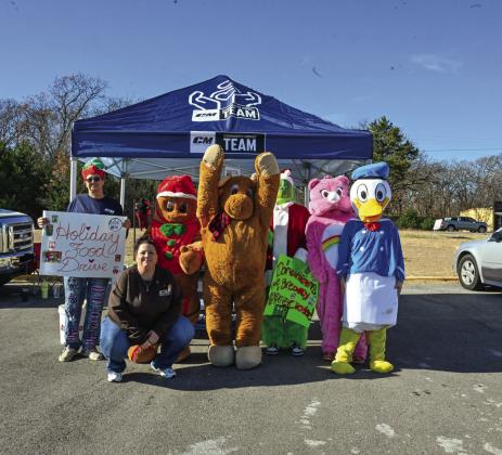 CM Truck Bed hosts Food Drive