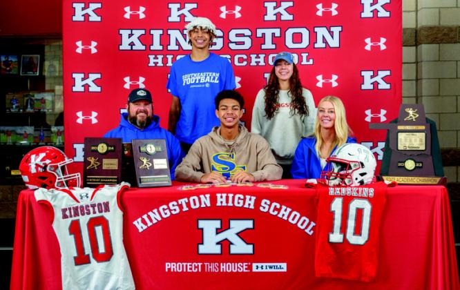 Sam Walker was named to the 2025 Oklahoma CoachesAssociationAll State Football Team. He is pictured above signing to play football at Southeastern Oklahoma State University. Courtesy photo.