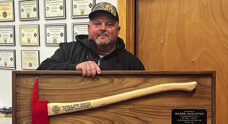 Baker Mchatton was presented a mounted axe for 30 years and seven months of service with the Madill Fire Department. . Brenda Mchatton